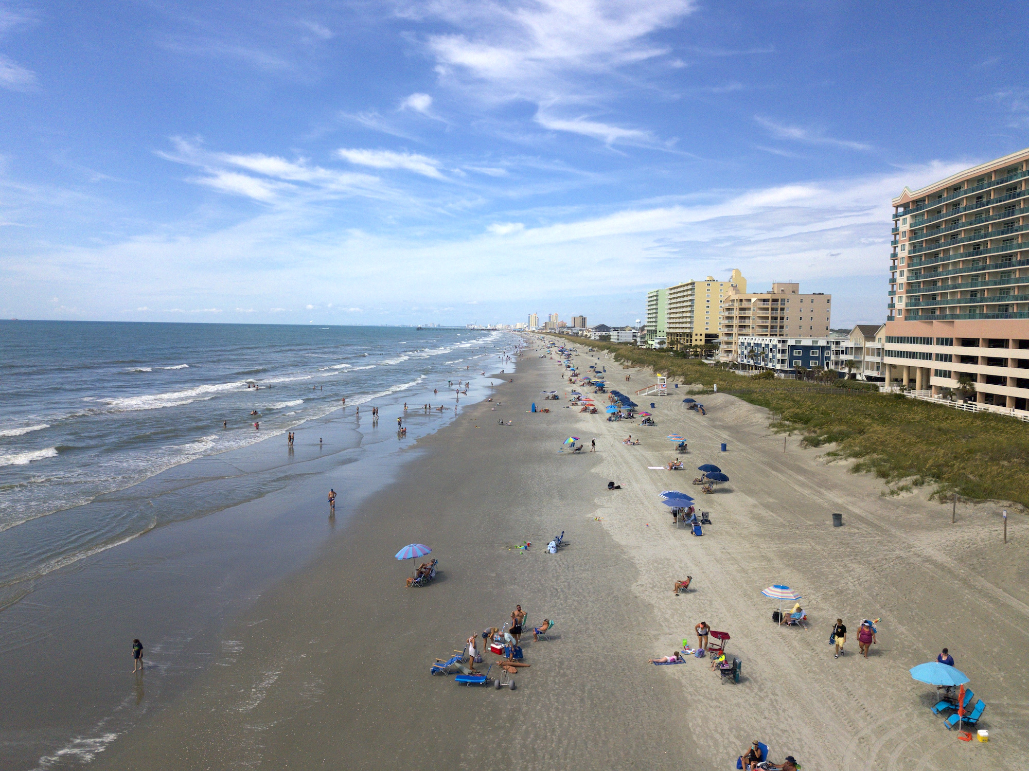 Aerial view overlooking the coastline in Cherry Grove Beach, with Laguna Keyes in the background