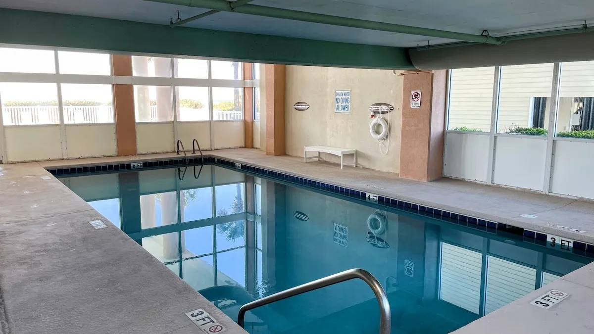 The indoor pool is completely enclosed, heated seasonally and has a depth range of 3 to 6 feet.